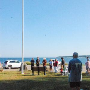 Organizers thanked people for coming to the picnic and honored service members who died in duty. 