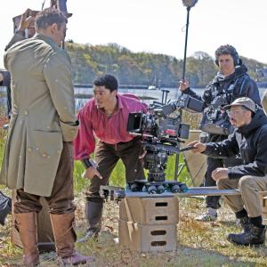 Tyson Brown as Paul Cuffe films a scene for the upcoming film "Cuffe: Untaxed" on the bank of the Slocums River.