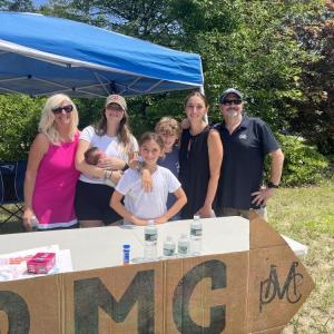 From left: Barbara Buckley, Aubrianne and Max Feeney, Quinn Buckley, Logan Buckley, Maegan Buckley and Jaimey Buckley cheered on Pan-Mass Challenge riders on Saturday, Aug. 1. Photos by Grace Roche