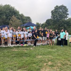 The Eitas family, surrounded by Madelyn's friends and soccer community, cut a ribbon to open Maddie's Circle at the Mariner Youth Soccer Complex on Friday, Aug. 28. Photos by Grace Roche