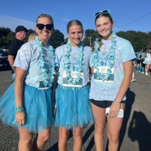 From left: Erin Norton, Cameron Norton and Cali Mills. “We’re here to run for Maddie Eitas, who we’ve known for a very long time,” Erin said. “She’s been very special to us, and we’re here to honor her memory.”