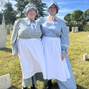 Jodie Camara, Mattapoisett assistant town clerk, and Cathy Heuberger, town clerk, dressed up as John Hammond’s two wives.