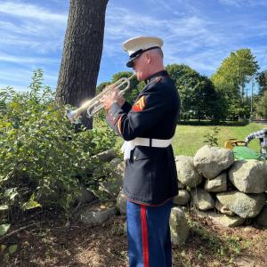 Mark Paradis, executive director of Taps for Veterans, played “Taps” on the trumpet. The organization’s mission is for every veteran to receive a live, 24-note salute, and it has over 1,500 volunteers across the nation that attend events such as these.