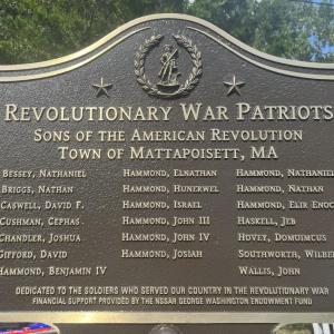 The plaque names 20 Revolutionary War soldiers from the Tri-Towns.
