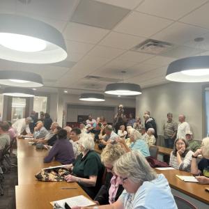Over 70 people packed the Mattapoisett Fire Department for a Conservation Commission hearing Monday, Sept. 14. Photo by Grace Roche