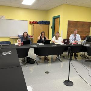 From left: School Committee members Nichole Nye McGaffey, Nichole Daniel and April Nye, and Superintendent Michael Nelson at the Sept. 17 School Committee meeting. Photo by Grace Roche 