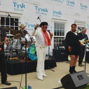 The artists, Robert Black and the Elvis Band, played rock music at the afternoon concert.