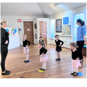 Young dancers wait for instruction from Miss Tess.
