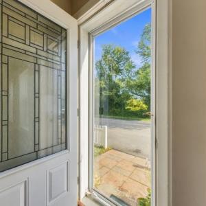 Front entry door with a decorative glass panel at the first-floor apartment, 17 Beeden Road, Westport