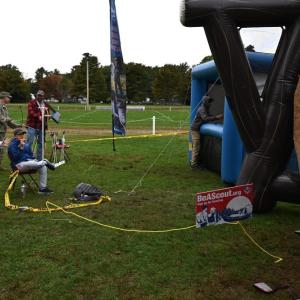 Theodore Patten playing at the inflatable axe throwing game.