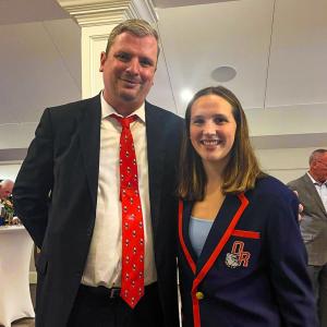Superintendent Michael Nelson and sophomore Mollie Osetkowski.