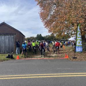 Cyclists wait to leave Red Brick Farm. 