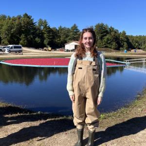 Editor Grace Roche dons waders before stepping into the bog. 