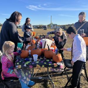 Kids and their families could paint pumpkins at the event. 