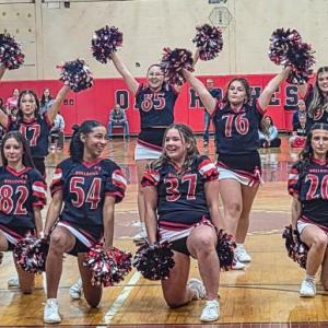 The cheer team performed a routine.