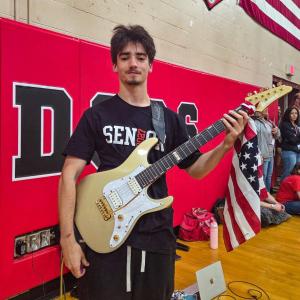 Senior Lincoln Fauteux performed the national anthem on his electic guitar.
