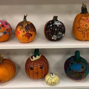Decorate a pumpkin for a spooky contest.