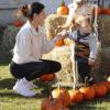 Fairhaven resident Dayme Maloney with her 1-year-old son Bennett Maloney pick out pumpkins. Photos by Grace Ann Natanawan