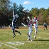 Henry Berry, far right, and Quinn Chisholm (center) jump for the ball. Photos by Mari Huglin