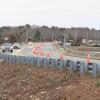 Cars travel the narrowed Route 6 bridge across the Weweantic River amidst ongoing construction. Photo by Grace Roche