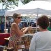 Maureen Starr talks to a customer during Harbor Days at Shipyard Park. Photos by Grace Roche