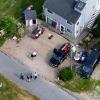 Police investigate 10 Harbor Road where the shooting occurred on June 30. Photos by David Curran