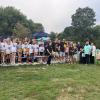 The Eitas family, surrounded by Madelyn's friends and soccer community, cut a ribbon to open Maddie's Circle at the Mariner Youth Soccer Complex on Friday, Aug. 28. Photos by Grace Roche
