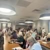 Over 70 people packed the Mattapoisett Fire Department for a Conservation Commission hearing Monday, Sept. 14. Photo by Grace Roche