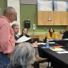 Luis Rivera, left, speaks during a Thursday, Sept. 24 School Committee meeting. Photo by Grace Roche