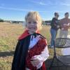 Hunter Hollis, 5, smiles with his freshly-painted vampire teeth to complete his costume at the Oct. 24 trunk or treat. Photos by Grace Roche